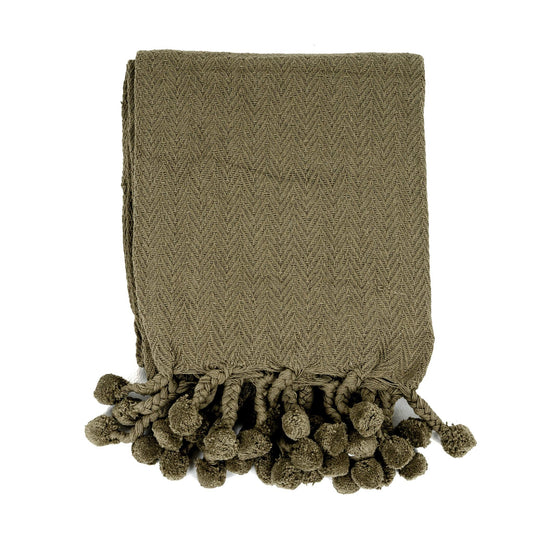 Coperta in cotone Vesla con nappe intrecciate a pompon in verde